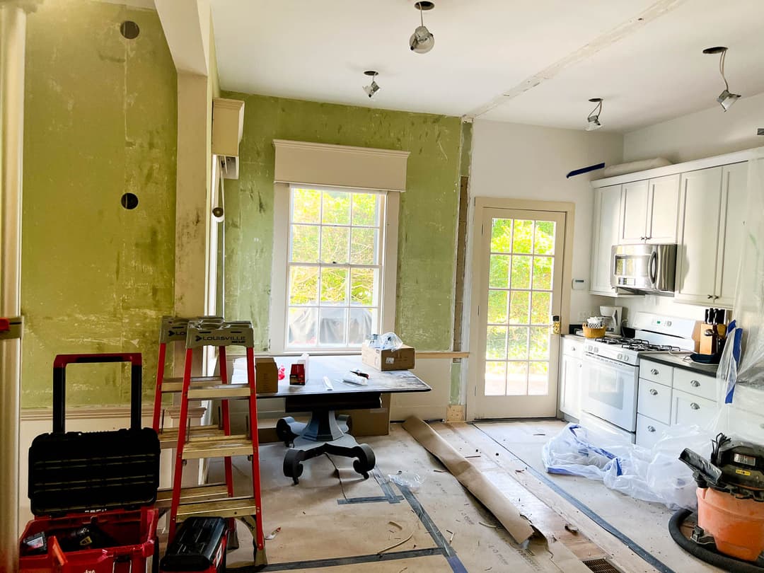 CMH West Wing fall 2023 renovation. During Wall removed – new ceiling lights – note original paint color